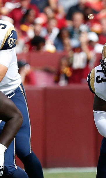 Rams still believe in Robinson, but flags keep flying